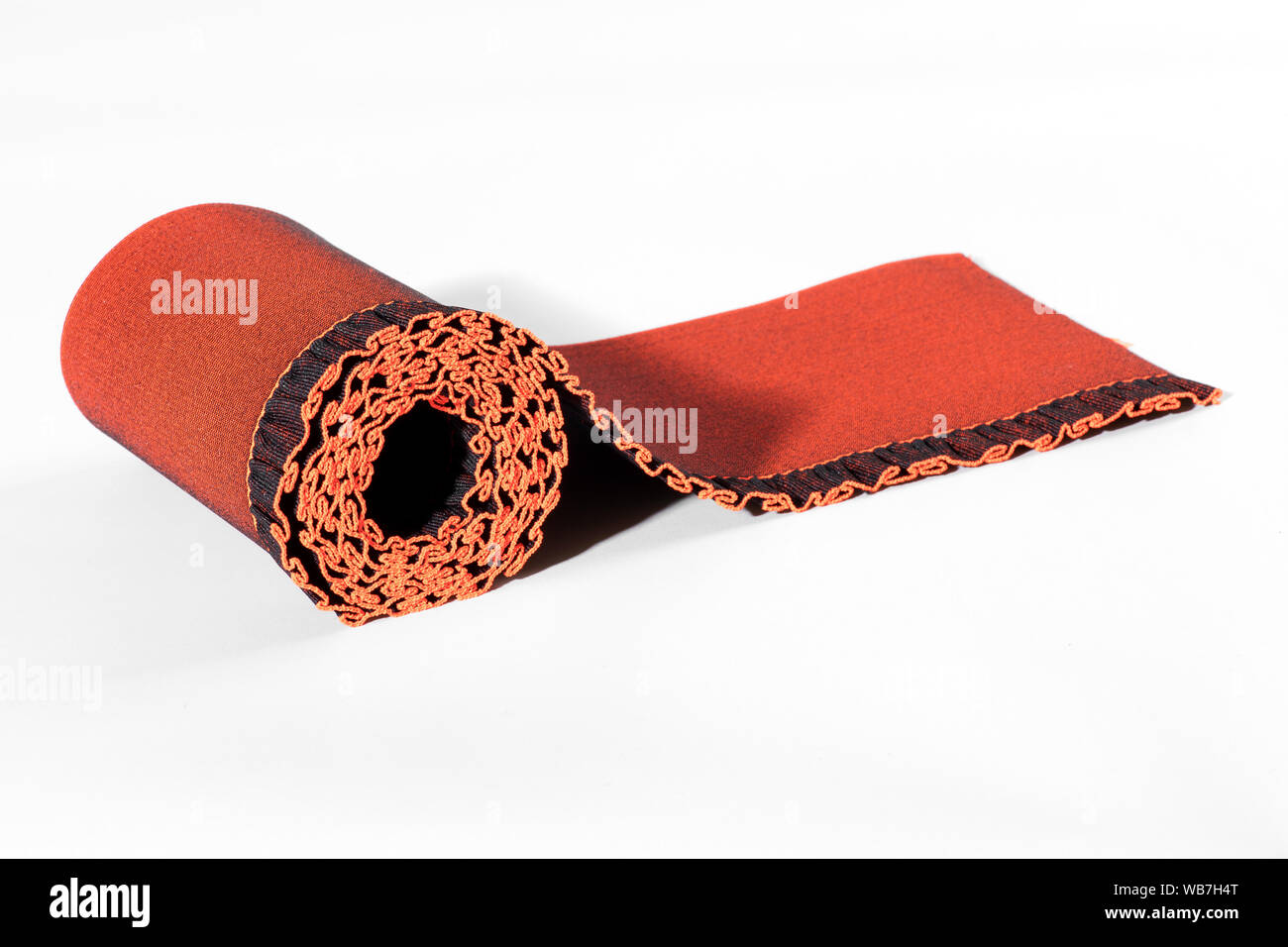 Roll Of Colorful Red Elastic Ribbon With Decorative Border