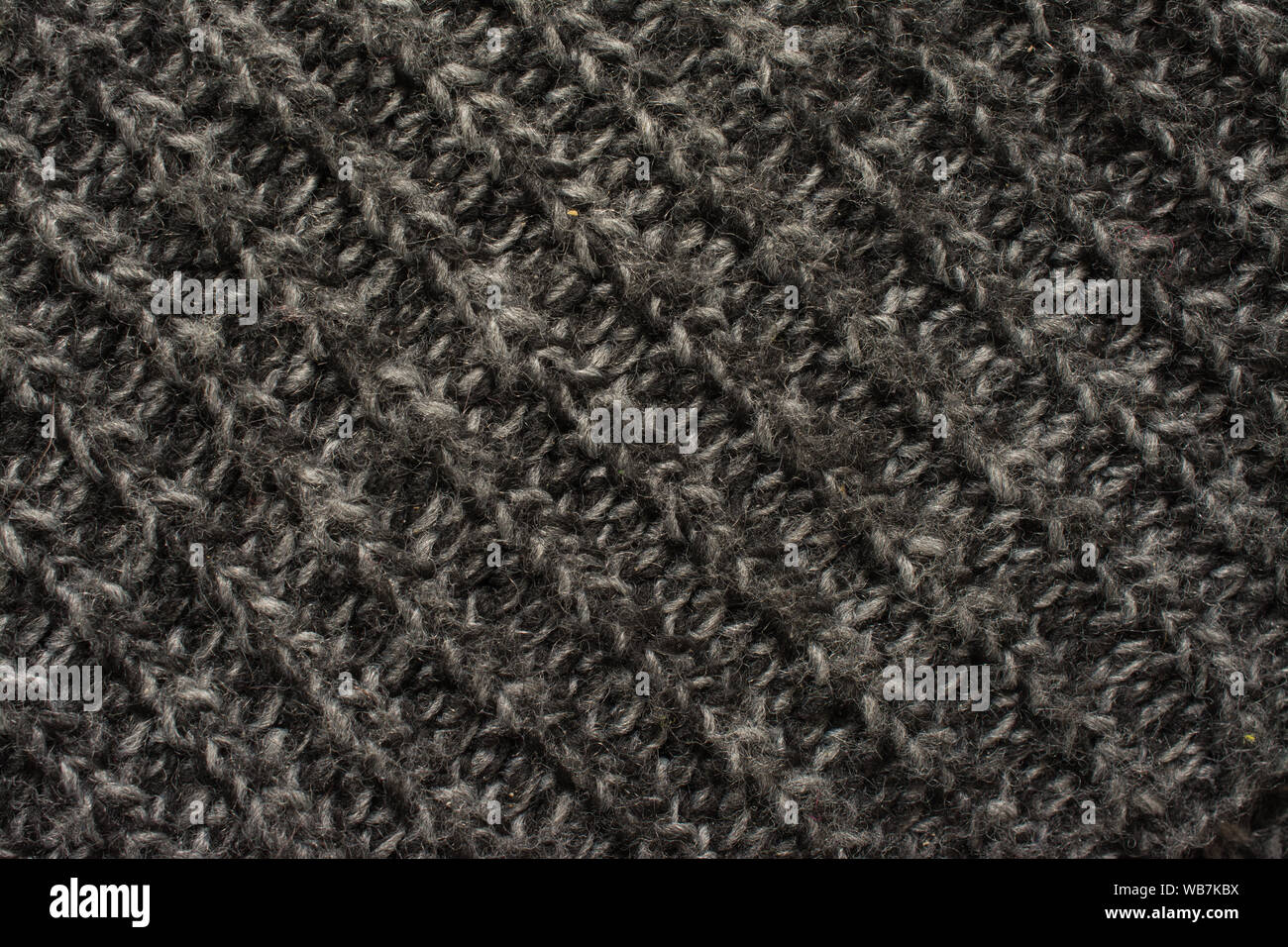 highly detailed needlework wool fabric, close up wool texture background Stock Photo
