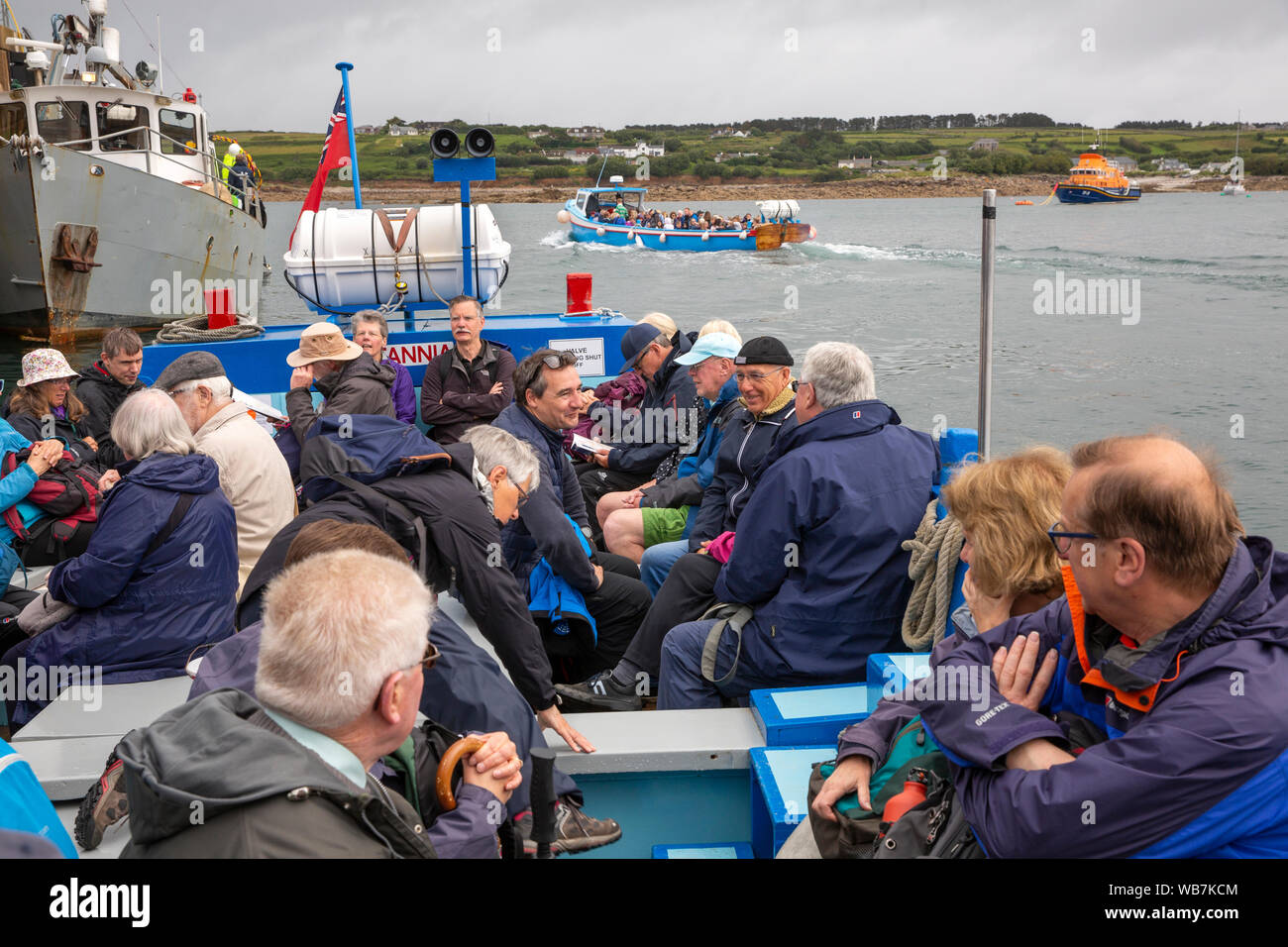 UK, England, Scilly Islands, St Mary’s , Hugh Town Harbour, passengers on scheduled inter island boat Britannia Stock Photo