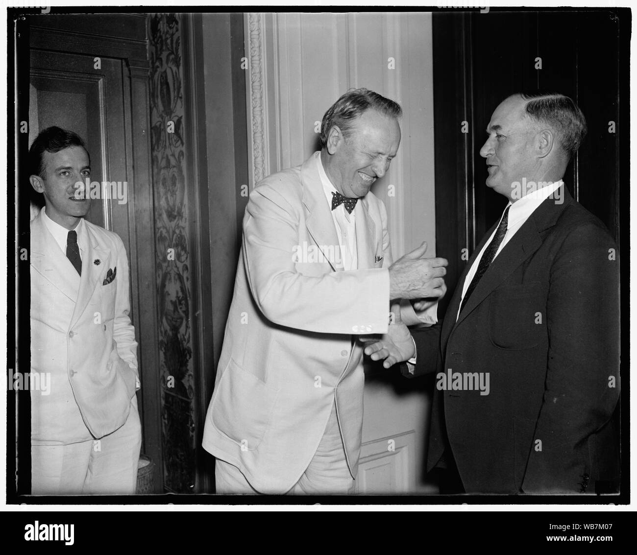 For and against. Washington D.C., July 22. Senator Henry F. Ashurst, (left) Chairman of the Senate Judiciary Committee and a strong adherent of the President's Court Reorganization Bill, greets Senator Edward R. Burke, who is leading the bloc of Democratic Senators opposing the bill, as he arrives to attend the extraordinary meeting of the Sneate Judiciary Committee today, 7/22/37 Abstract/medium: 1 negative : glass ; 4 x 5 in. or smaller Stock Photo