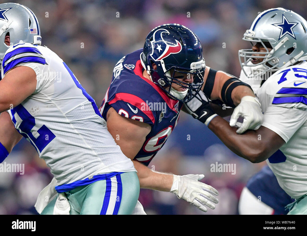 Arlington, Texas, USA. 24th August, 2019. Houston Texans defensive end J.J.  Watt (99) tries to elude Dallas Cowboys offensive tackle Cameron Fleming  (75).during an NFL football game between the Houston Texans and
