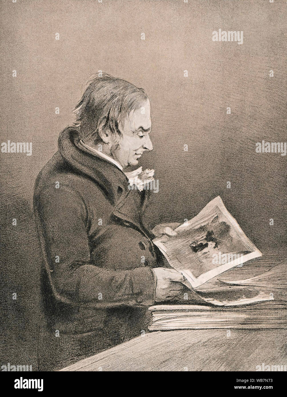 J.M.W. TURNER (1775-1851) English romantic artist checking some of his sketches about §1840 Stock Photo