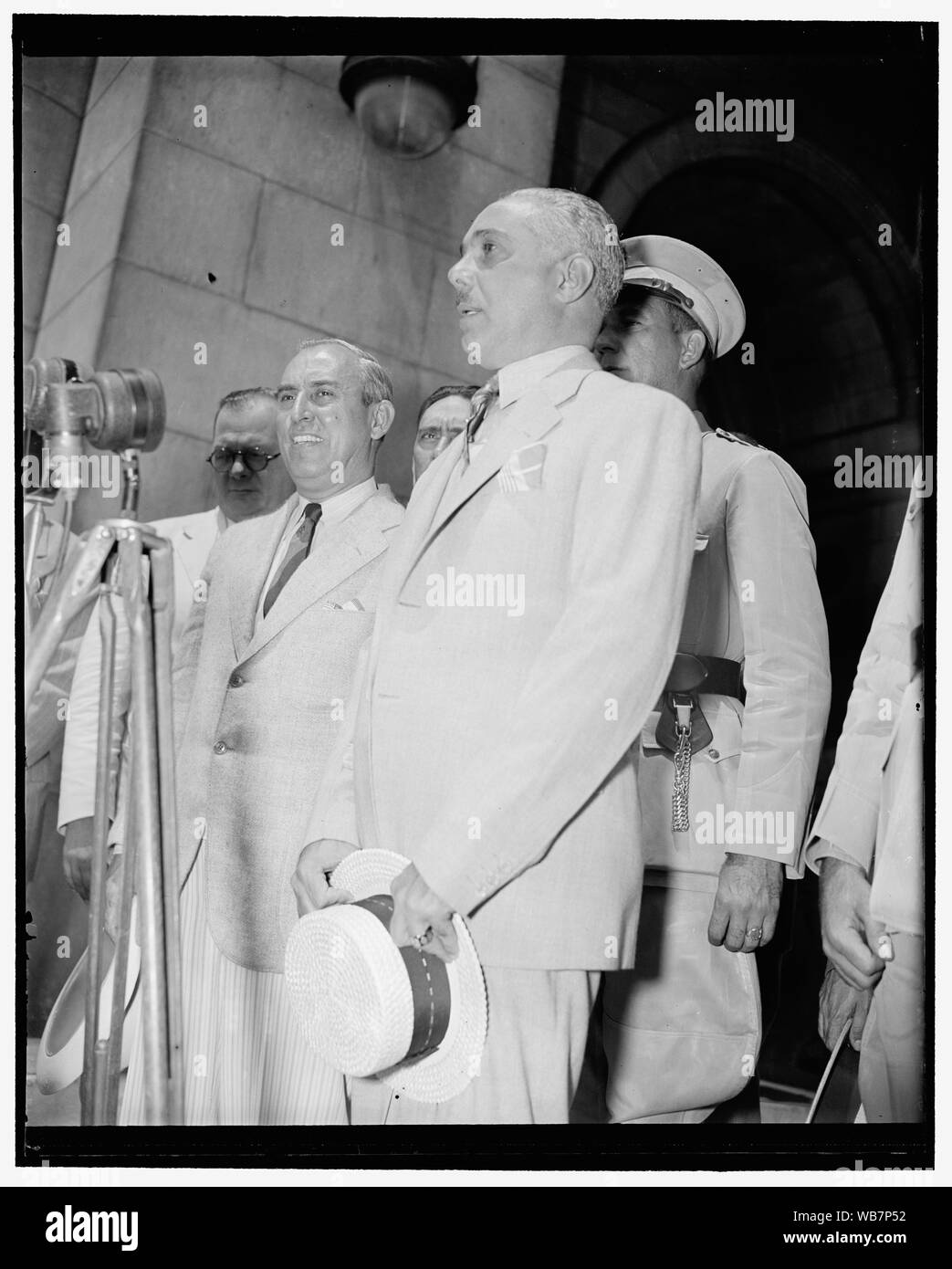 Former President [of] San Domingo arrives in Capital. Washington, D.C., July 6. A close-up of General Rafael L. Trujillo, former President of the Dominican Republic, made as he stood at attention while the national anthem was being played upon his arrival today Abstract/medium: 1 negative : glass ; 4 x 5 in. or smaller Stock Photo