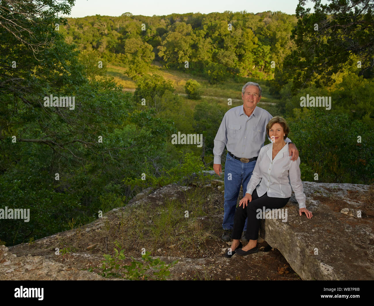 Former U.S. President George W. Bush and former first lady Laura Bush at one of their favorite overlooks on their 1,600-acre ranch near Crawford in McLennon County, Texas Stock Photo