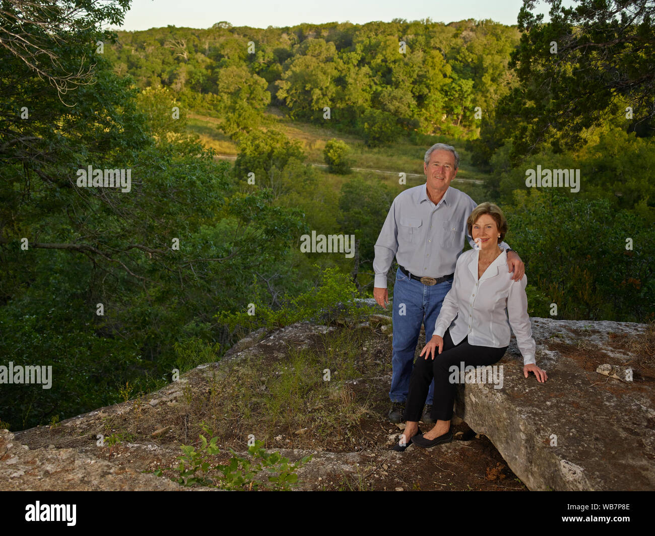 Former U.S. President George W. Bush and former first lady Laura Bush at one of their favorite overlooks on their 1,600-acre ranch near Crawford in McLennon County, Texas Stock Photo