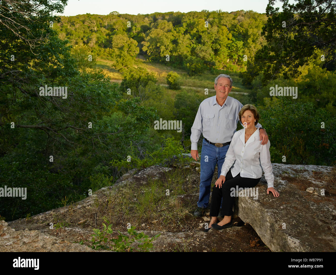 Former U.S. President George W. Bush and former first lady Laura Bush at one of their favorite overlooks on their 1,600-acre ranch near Crawford in McLennon County, Texas Stock Photo