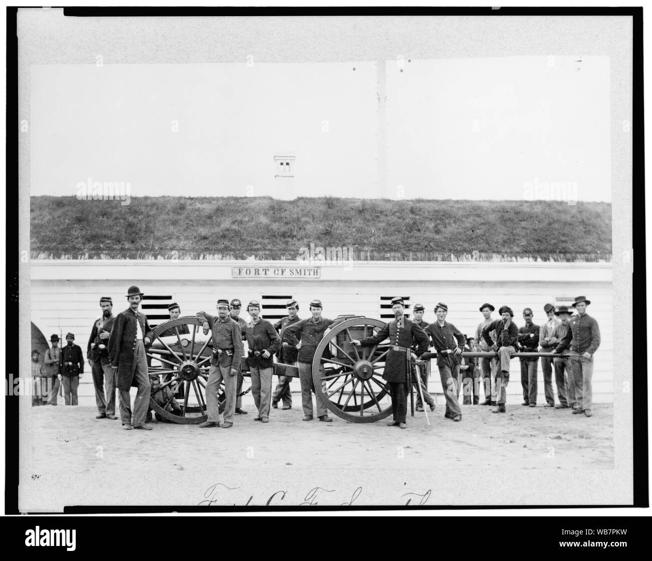 Fort C.F. Smith, Co. L, 2d New York Artillery Abstract: Group of soldiers with cannon and caisson. Stock Photo