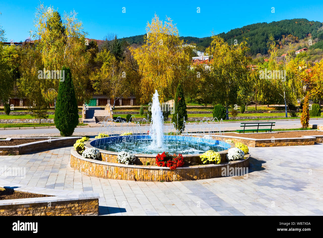Fountain and autumn trees in Makedonska Kamenica town, Republic of