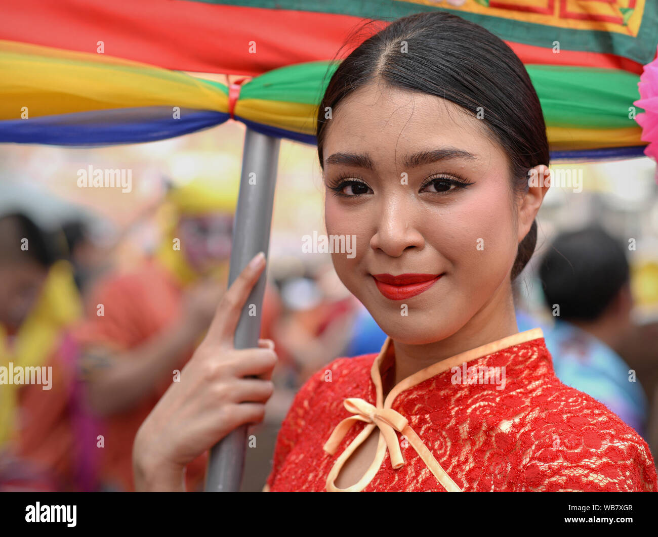 Woman holding chinese flag hi-res stock photography and images - Alamy