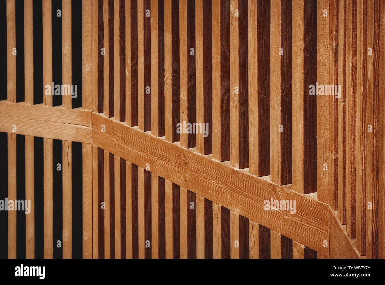 Closeup of wooden fence forming a geometric pattern Stock Photo Alamy