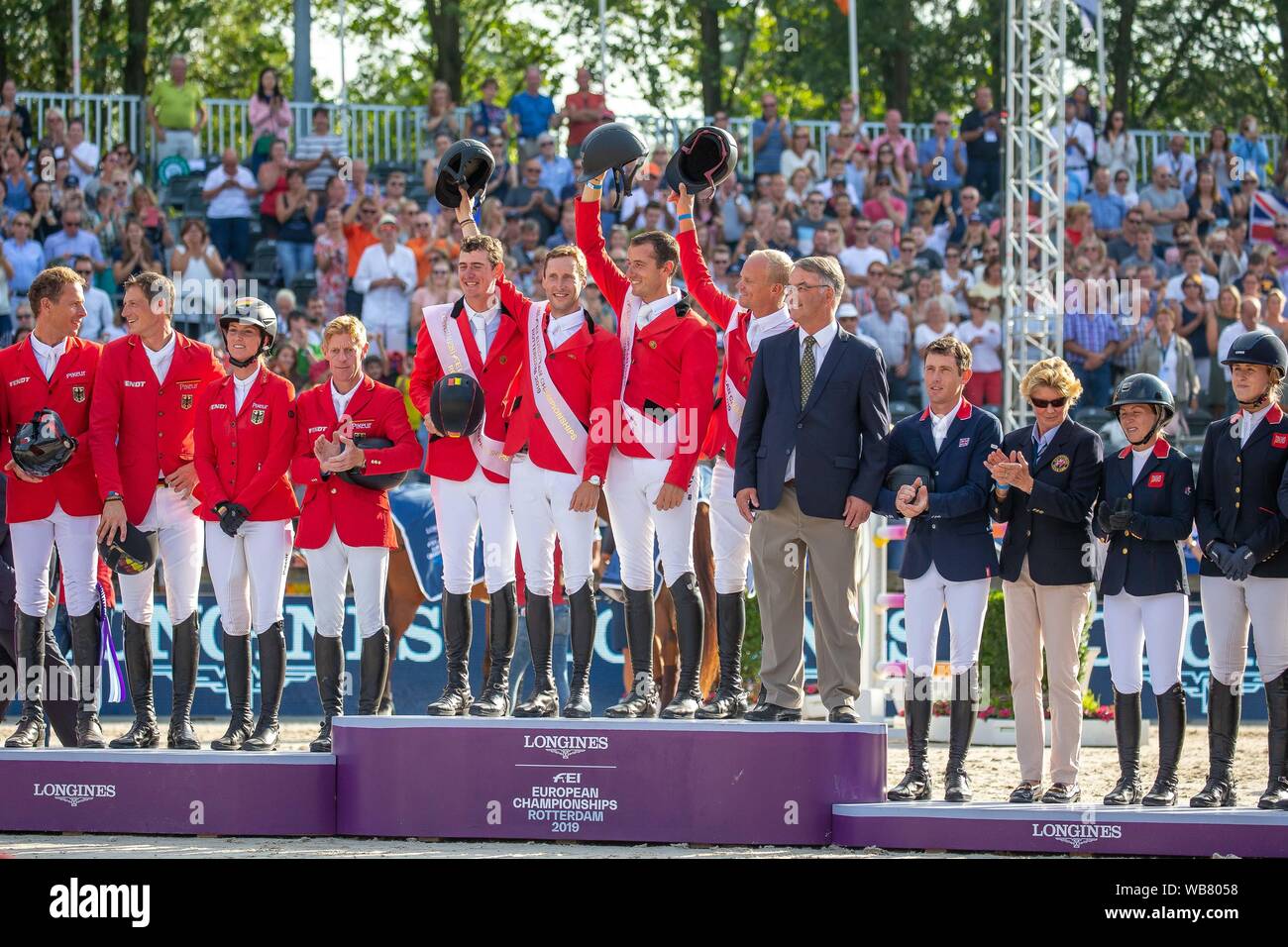 Rotterdam. Netherlands. 23 August 2019. Team Gold Medal. Team Belgium.  L-R. Jos Verlooy. Pieter Devos. Gregory Wathelet. Jerome Guery and  Chef d'Equipe Peter Weinberg in the Team Final. Podium. Prizegiving. Showjumping. Longines FEI European Championships. Credit Elli Birch/SIP photo agency/Alamy live news. Stock Photo