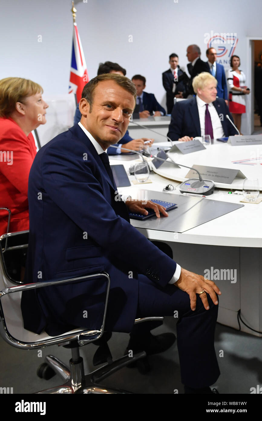 France's President Emmanuel Macron smiles before hosting the first working session of the G7 Summit in Biarritz, France. Stock Photo