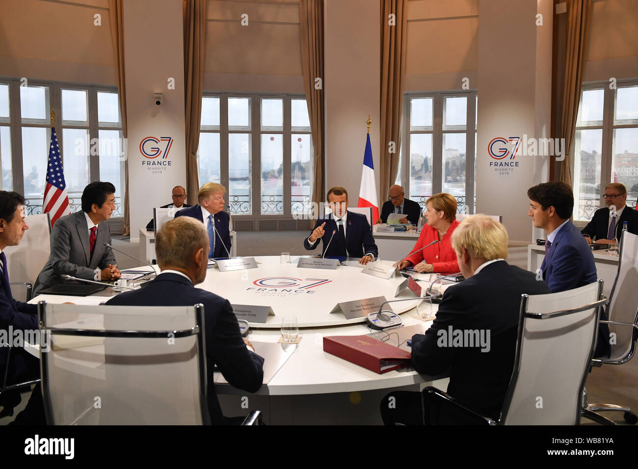 Canada's Prime Minister Justin Trudeau, Prime Minister Boris Johnson, Germany's Chancellor Angela Merkel, European Council President Donald Tusk, France's President Emmanuel Macron, Italy's Prime Minister Giuseppe Conte, Japan's Prime Minister Shinzo Abe and US President Donald Trump meet for the first working session of the G7 Summit in Biarritz, France. Stock Photo