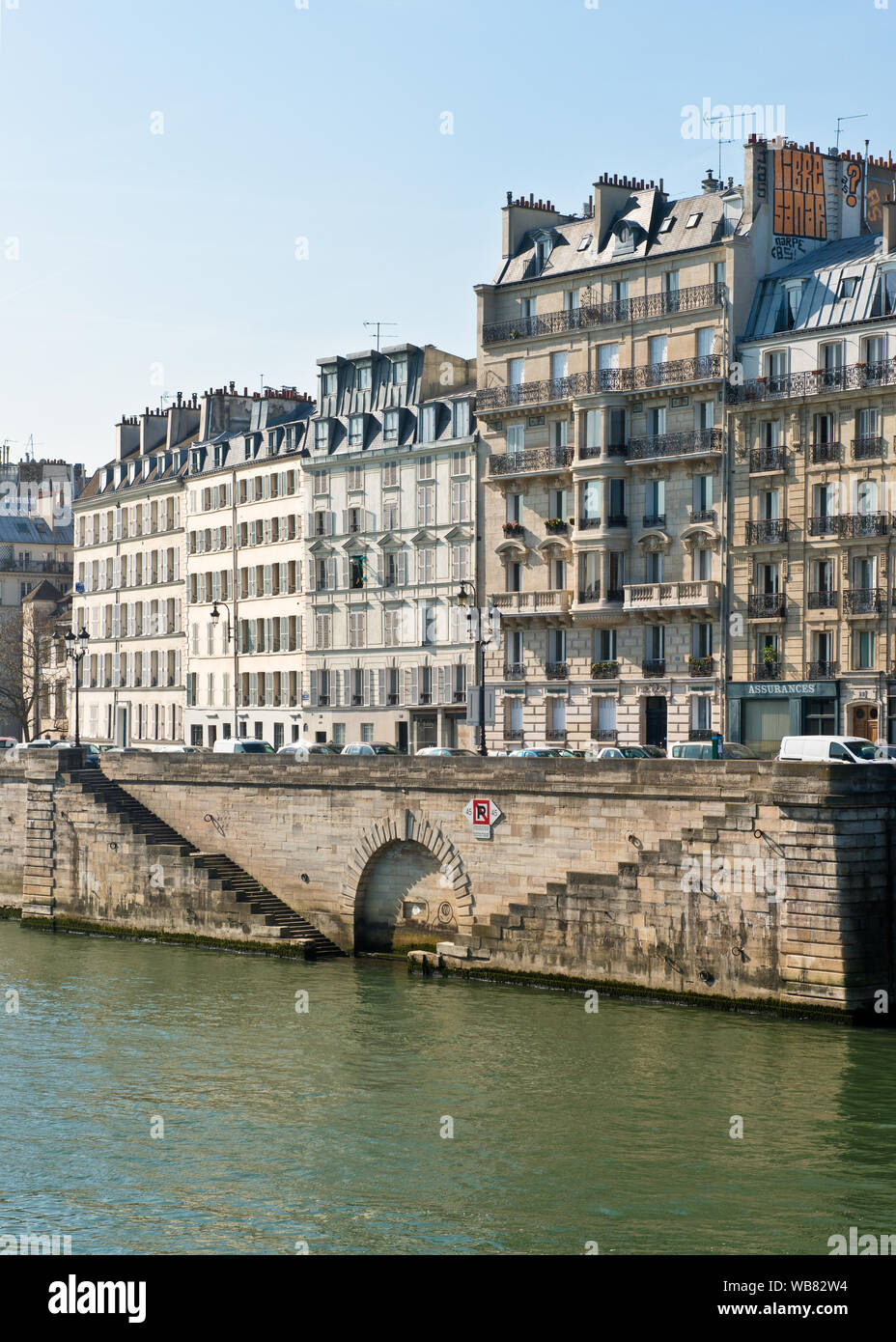 Apartments of Quai aux Fleurs waterfront and steps. Ile de La Cite