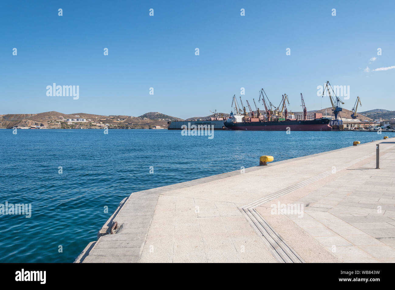 The port and the shipyard (Neorion) of Ermoupolis town of Syros island, Cyclades, Greece Stock Photo