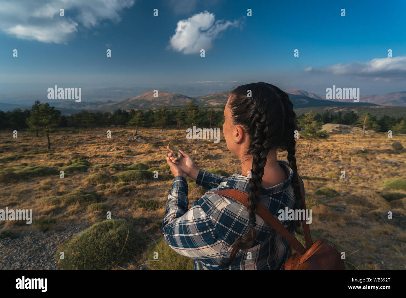 Female hiker map compass hi-res stock photography and images - Alamy