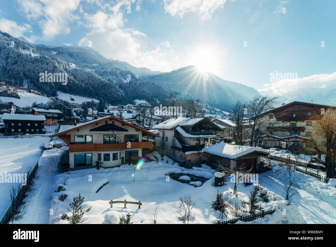 House architecture and snow winter landscape at Mayrhofen in Zillertal valley in Alps in Tirol in Austria. Townhouse real estate and residential build Stock Photo