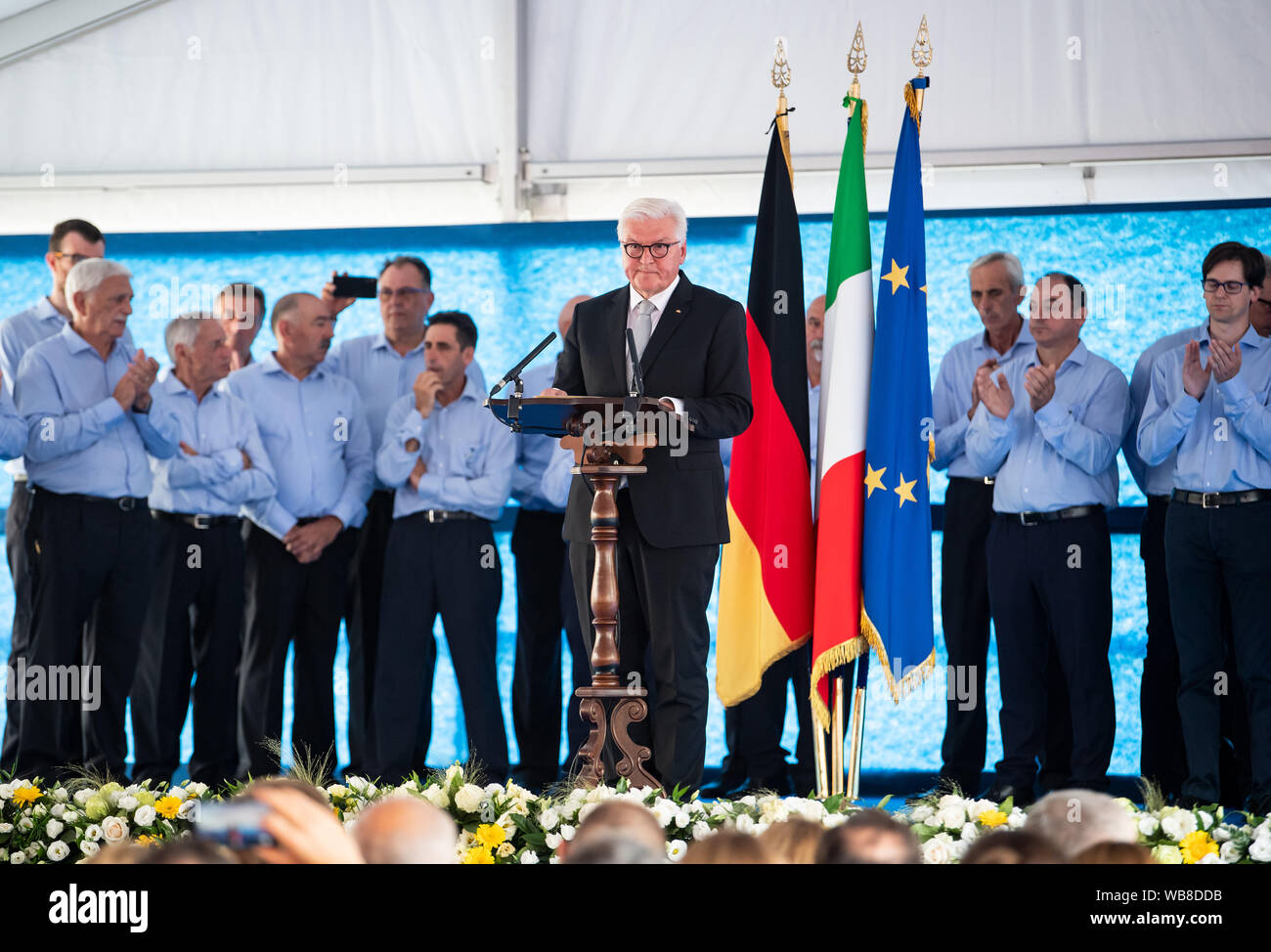 Fivizzano, Italy. 25th August 2019. President Frank-Walter Steinmeier gives an Italian speech at the commemoration ceremony for the victims of the Fivizzano massacres. In the final phase of the Second World War, Wehrmacht soldiers and SS murdered several thousand civilians in Italy. 75 years ago, in the region around Fivizzano in northern Tuscany alone, almost 400 men, women, old people and children were murdered by the Germans, often in an unimaginably cruel way, in a massacre lasting several days. Federal President Steinmeier and his wife take part in the annual commemoration ceremony for th Stock Photo