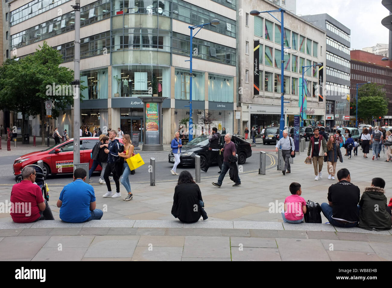 Shoppers and  pedestrians in a busy Manchester City Centre, England UK. Stock Photo