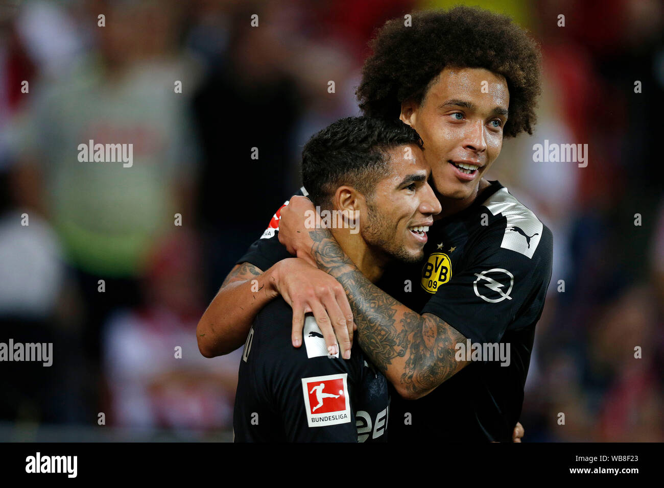 Cologne, Germany  1. Fussball - Bundesliga,  Matchday 2 1.FC Cologne ( 1.FC Kšln ) Koeln vs. Borussia Dortmund 1-3 on 23. August 2019  in the Rhein Energie Stadium in Cologne / Germany Achraf HAKIMI (BVB) -L- and  Axel WITSEL (BVB) -R- Foto: Norbert Schmidt, Duesseldorf Stock Photo