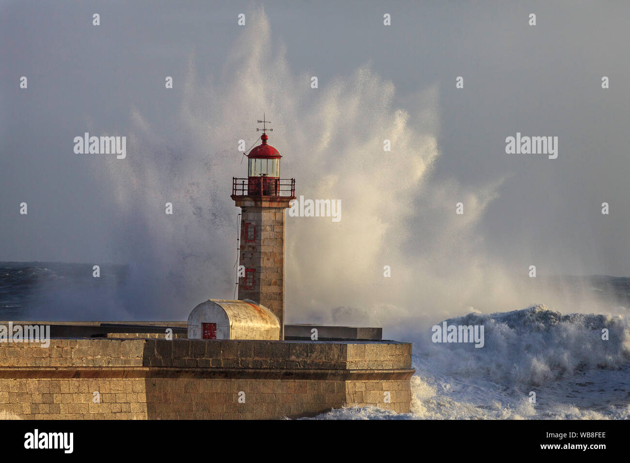 Big waves hit the Felgueiras lighthouse Stock Photo