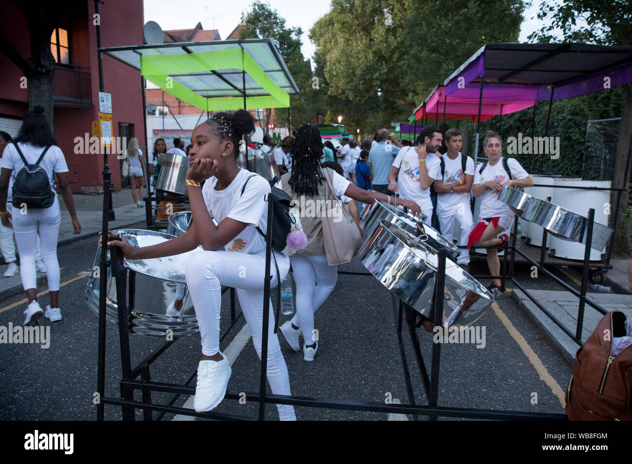 Players of the steel bands have to push their flocks along the streets near the venue and wait their turn to perform at Panorama. Mangrove, the reigni Stock Photo