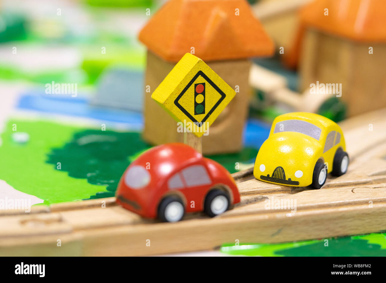 stop road sign - woden Toy Set Street Signs, cars for kids Play set Educational toys for preschool indoor playground (selective focus) Stock Photo