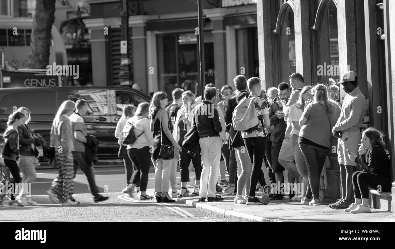 Saturday London street energy with lots of people. Stock Photo