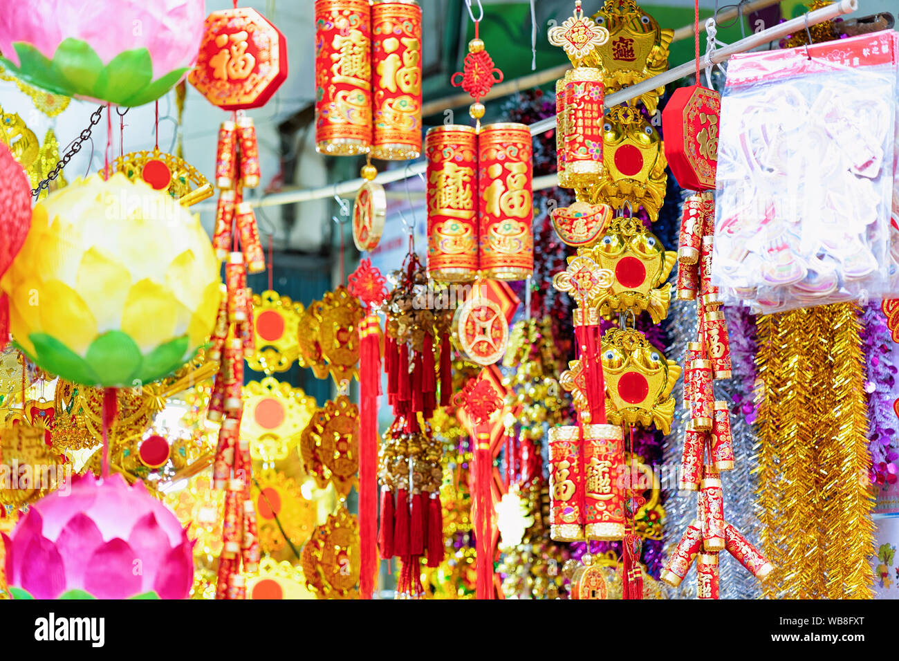 Street market shop selling paper lanterns and decorations hanging in ...