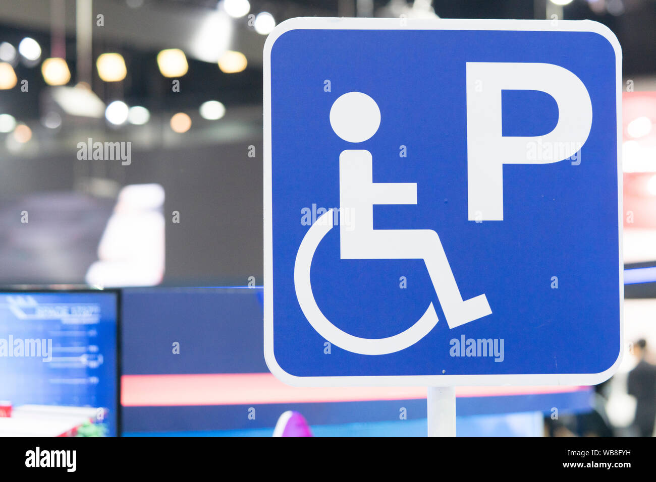 disabled parking or Wheelchair parking sign In the parking lot of the mall, Do the parking for the disabled, Slope area for wheelchairs. Stock Photo