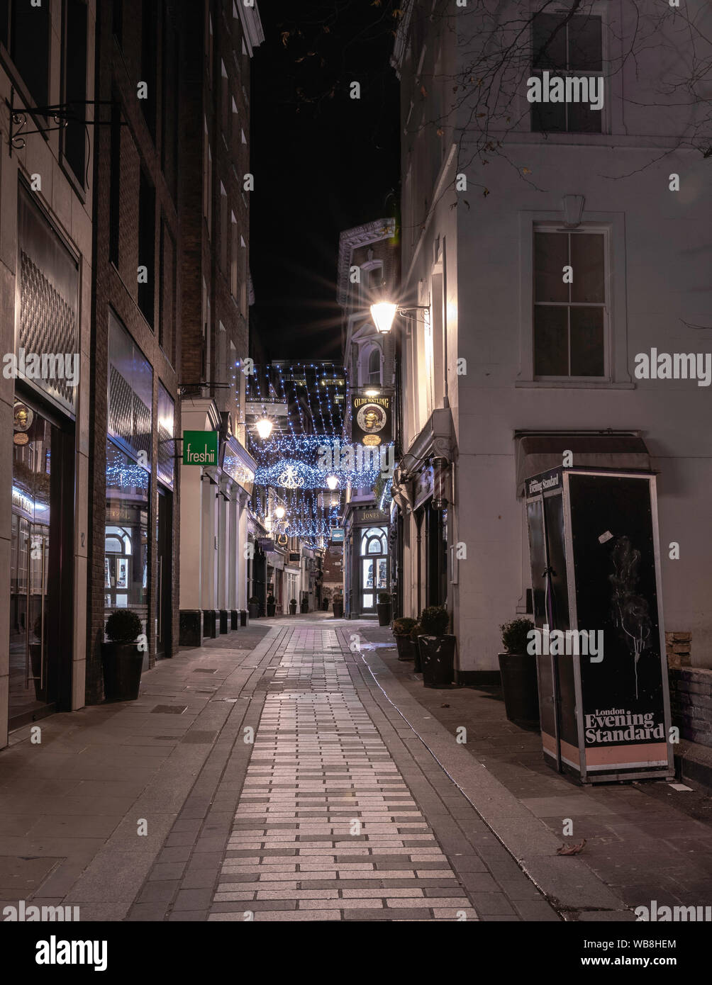 London street at night. Chrismass month. Stock Photo
