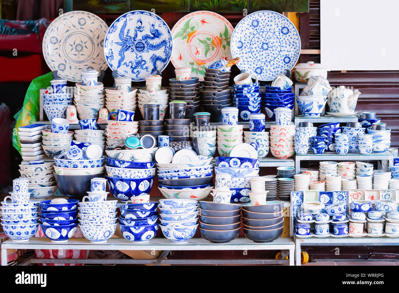 Traditional Vietnamese blue porcelain utensils with plates and cups and