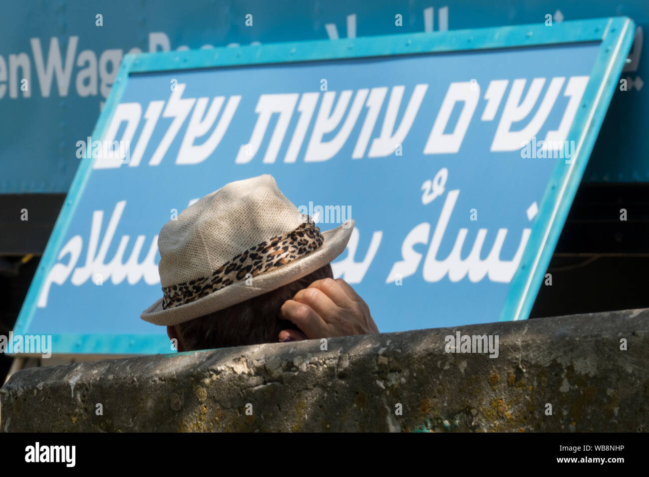 Jerusalem, Israel. 25th August, 2019. Women Wage Peace kick start their 4 day 'Journey of Hope' with an event at the Wohl Rose Garden opposite the Knesset ahead of the second round of 2019 national elections scheduled for 19th September, 2019. Assembling from all over the country, both Jewish and Arab women, they voice their demand from government for a political agreement with the country's adversaries and urge everyone to vote without concessions on equality, security and peace. Credit: Nir Alon/Alamy Live News. Stock Photo