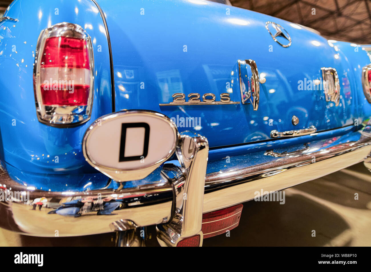 Berlin, Germany - December 11, 2017: Back headlight of blue Mercedes Benz 220 s vintage classic car in Berlin in Germany. Details of auto Stock Photo