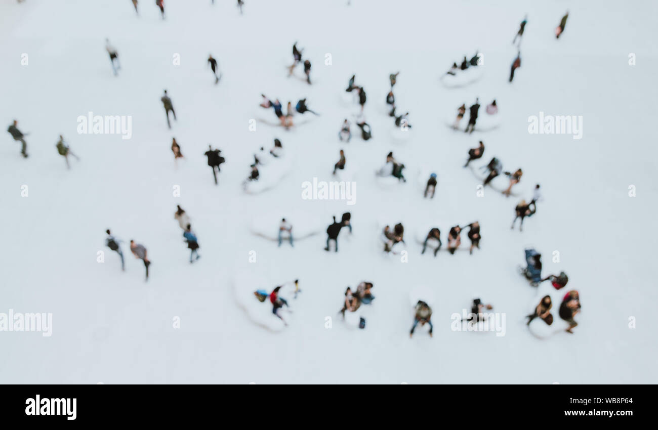 Blurred concept with a mass of people doing things. view from above Stock Photo