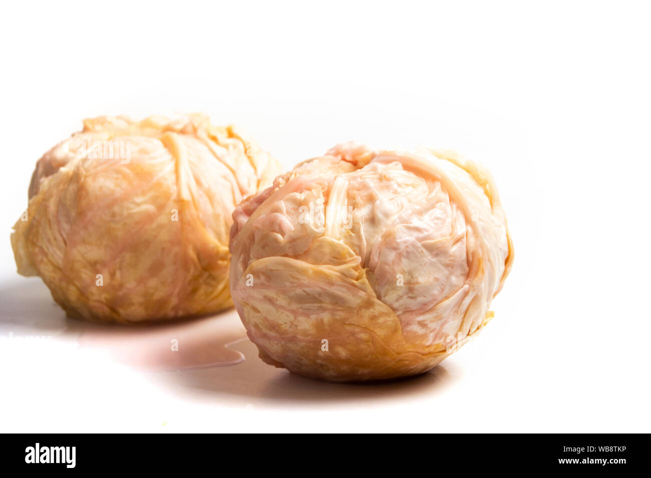 Sliced sour cabbage isolated on white background Stock Photo