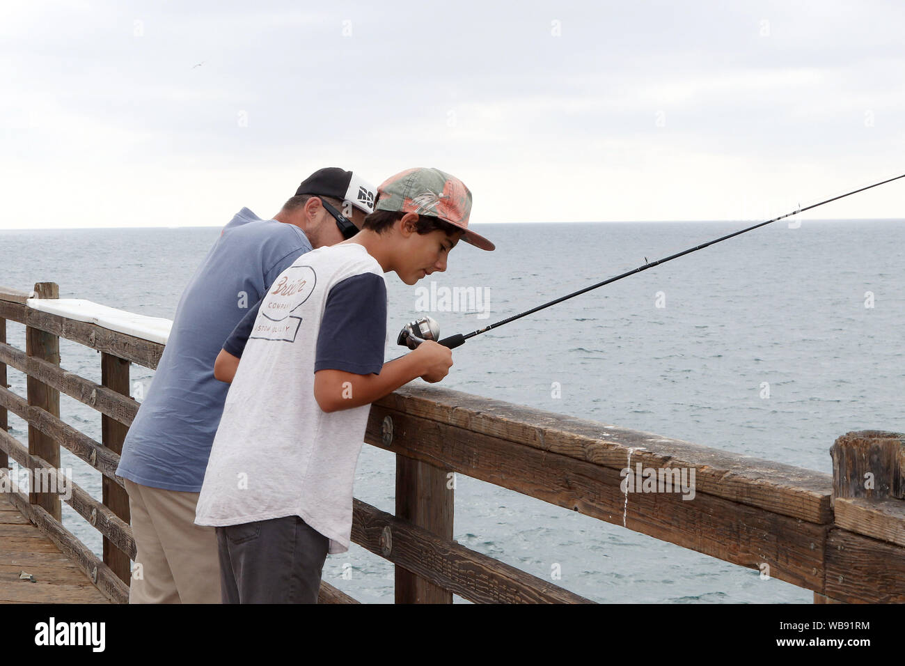 Fishing on Oceanside, California pier Stock Photo Alamy