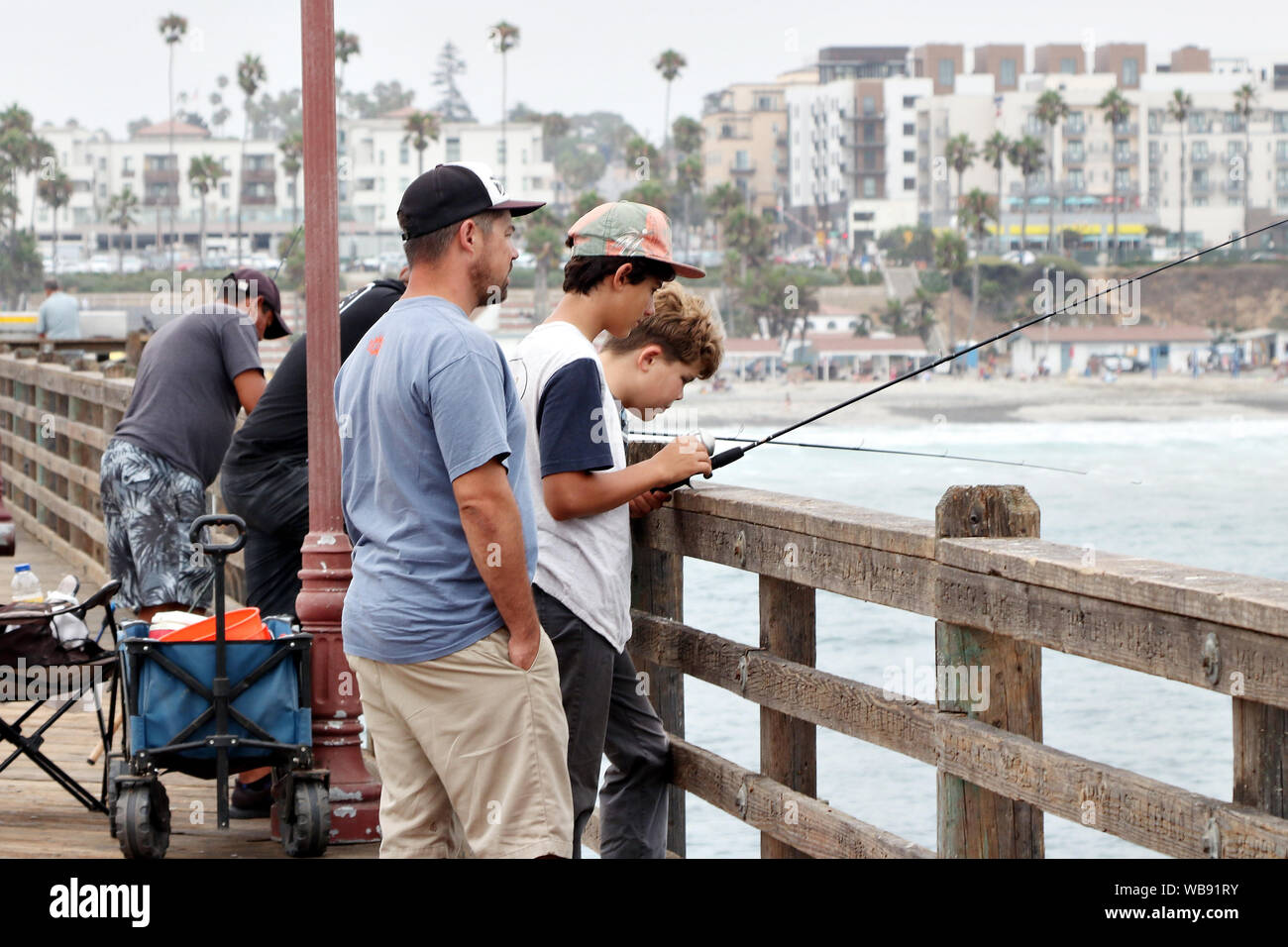 Fishing on Oceanside, California pier Stock Photo Alamy