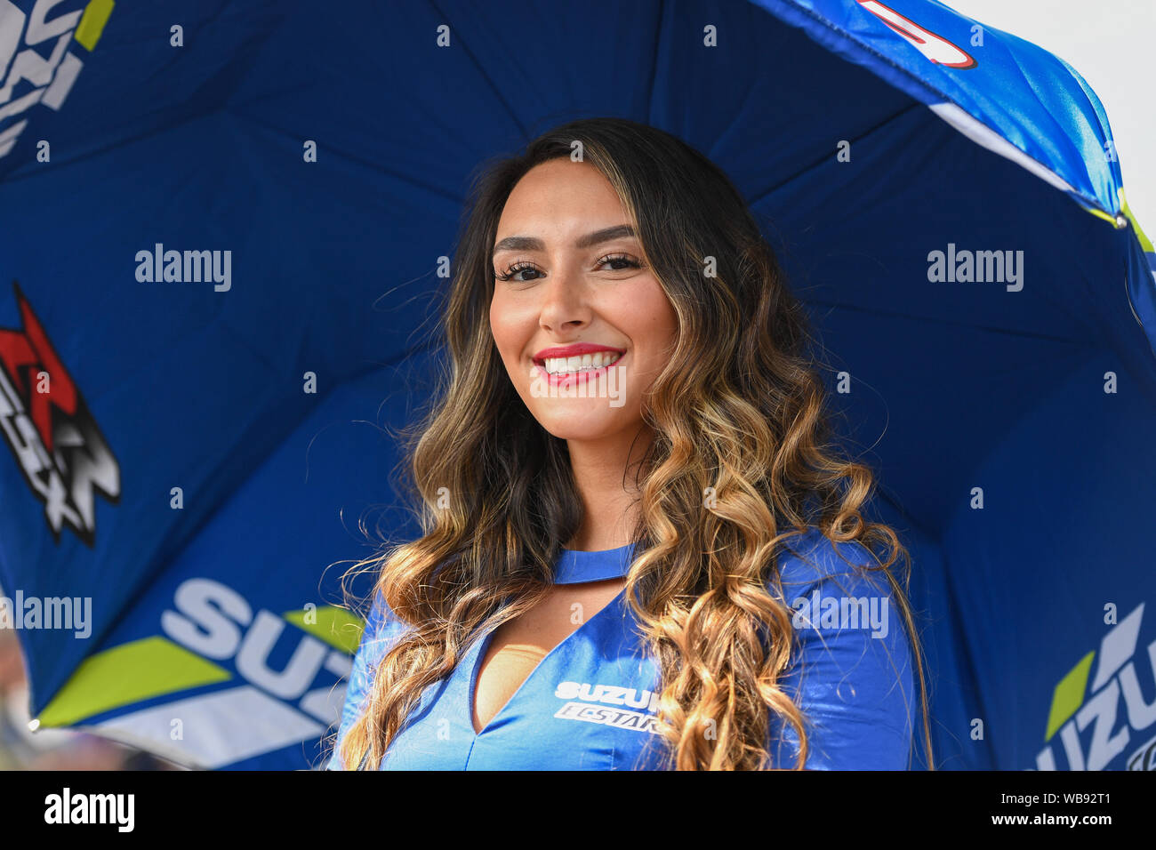 Towcester, UK. 25th Aug, 2019.  25th Aug, 2019. A grid girl for Alex Rins (SPA) of Team SUZUKI ECSTAR during Sunday’s Race of  GoPro British Grand Prix at Silverstone Circuit on Sunday, August 25, 2019 in TOWCESTER, ENGLAND. Credit: Taka G Wu/Alamy Live News Stock Photo