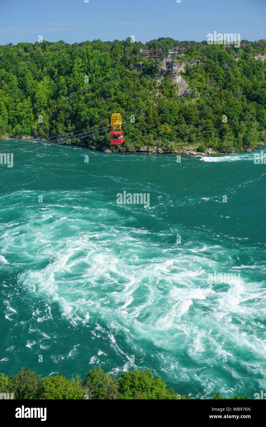 Niagara Falls, Ontario, Canada An antique cable cars carries visitors across the Niagara River Niagara Falls, Ontario, Canada An antique cable cars carries visitors across the Niagara River