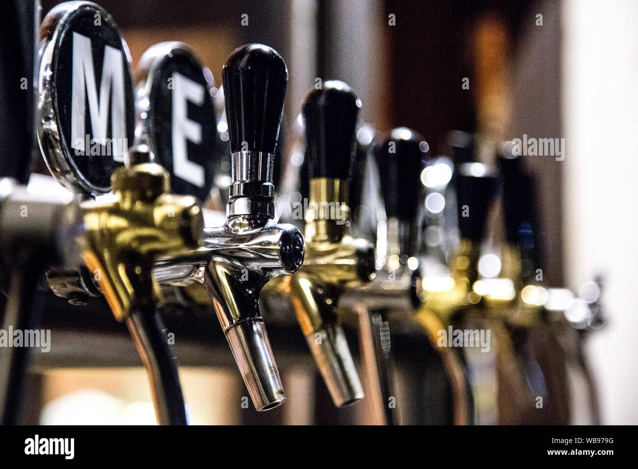 Beer taps at Same Krafty - multitap craft beer pub in Stare Miasto (Old Town) Warsaw, Poland Stock Photo