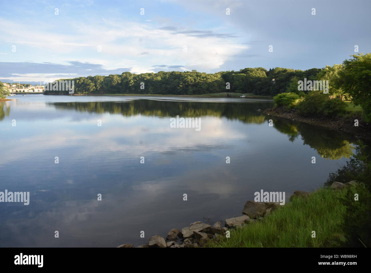 View of Bass River in Beverly, Massachusetts, with a row of homes on