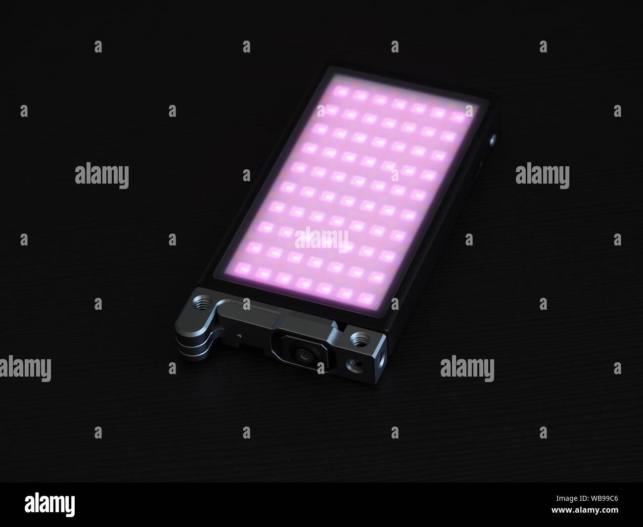 RGB light on a dark background. Pink light Stock Photo Alamy