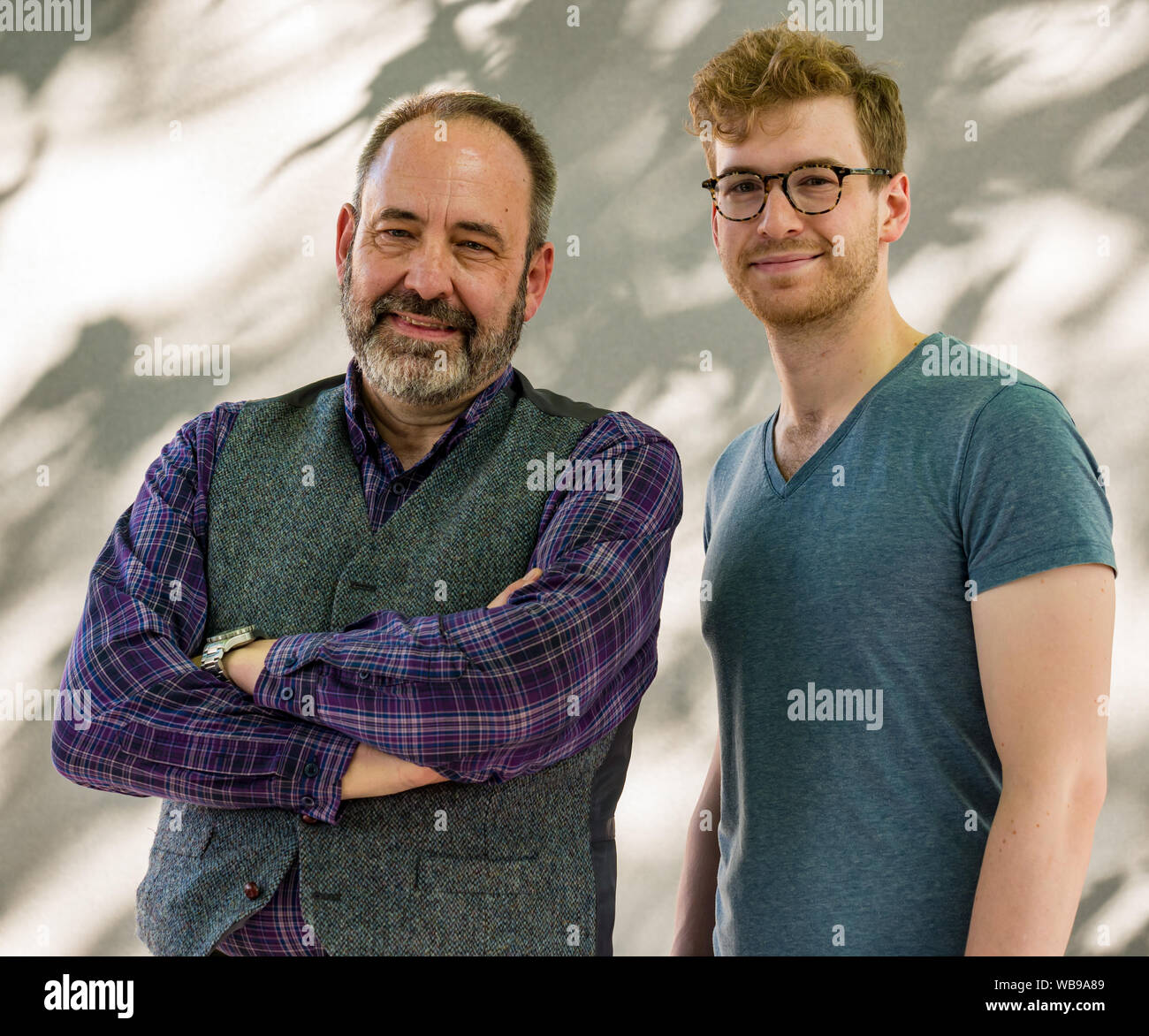Edinburgh, Scotland, UK, 25 August 2019. Edinburgh International Book Festival. Pictured: James & Tom Morton are father and son. Tom is a Scottish writer, broadcaster, journalist and musician. James is a Scottish doctor, celebrity baker, author Stock Photo