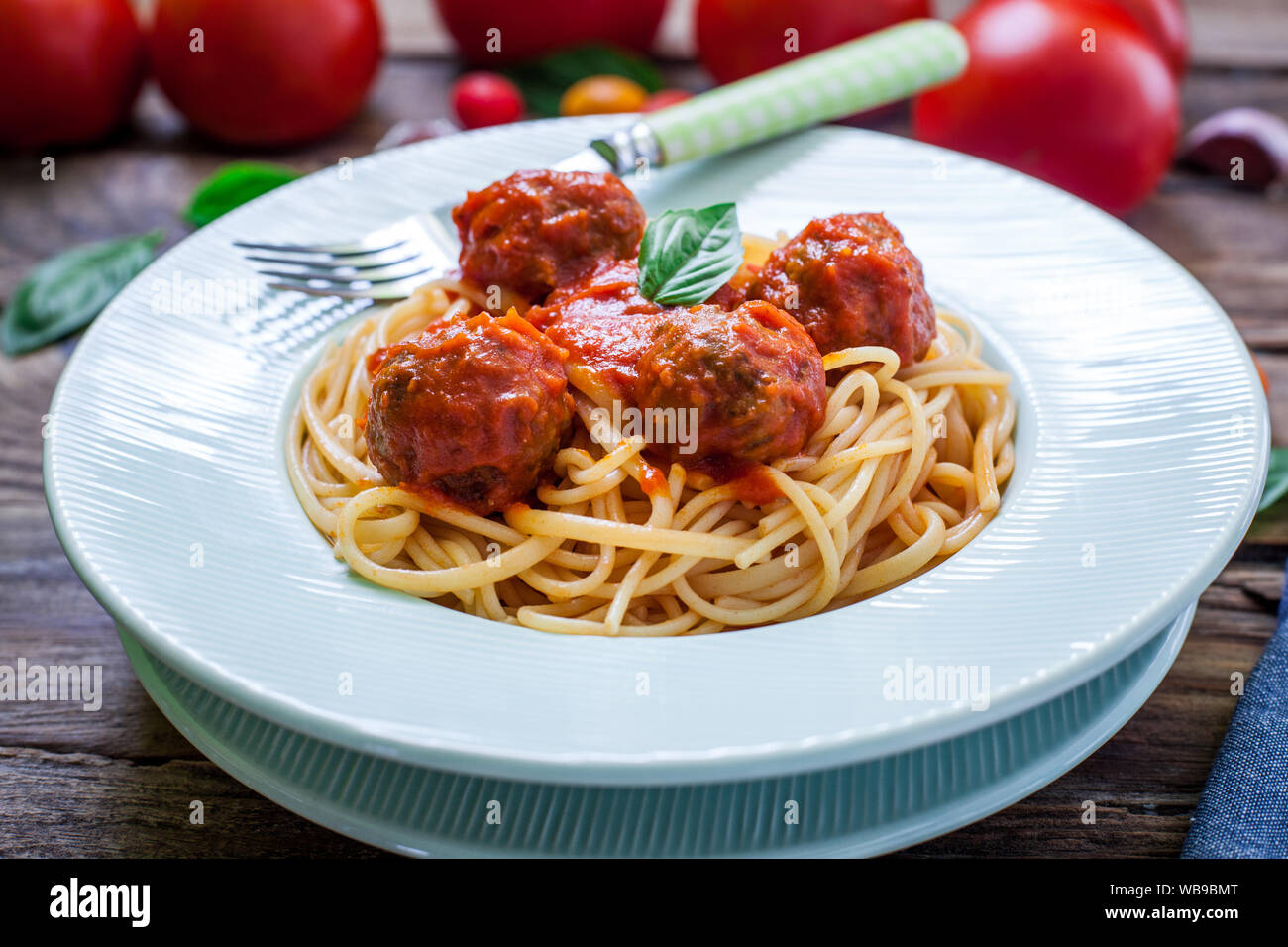 homemade italian spaghetti with meatballs on tomato sauce Stock Photo