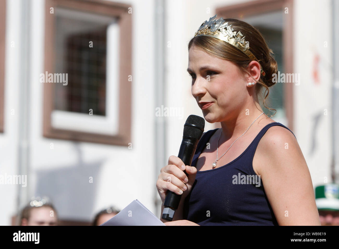 Worms, Germany. 24th August 2019. The Rhine-Hessian wine queen Anna Göhring addresses the opening ceremony of the Backfischfest 2019. The largest wine and funfair along the river Rhine, the Backfischfest started in Worms with the traditional handing over of power from the Lord Mayor to the mayor of the fishermen’s lea. The ceremony was framed by dances and music. Stock Photo