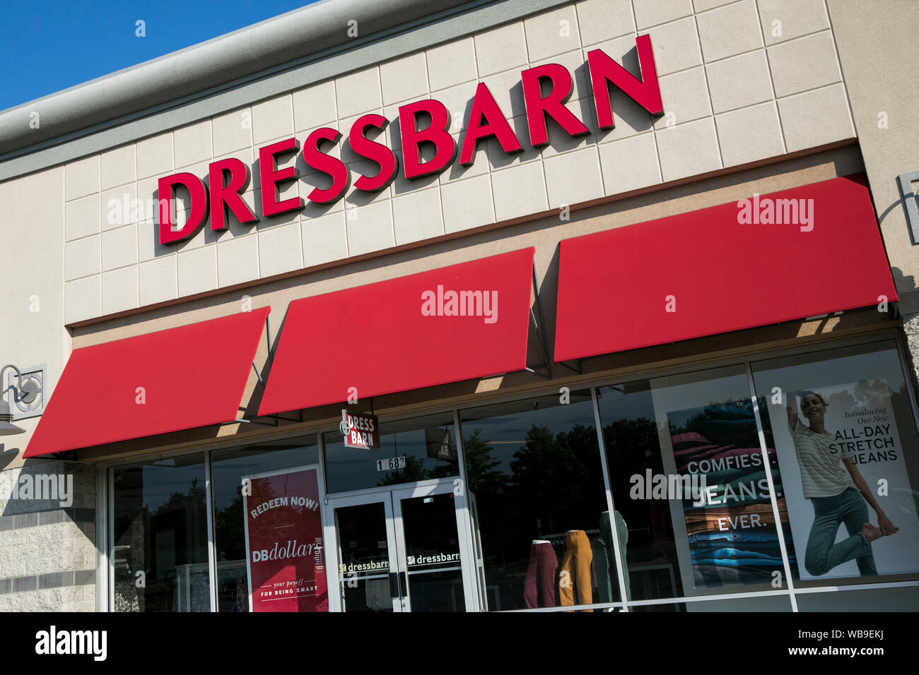 A Logo Sign Outside Of A Dressbarn Retail Store Location In