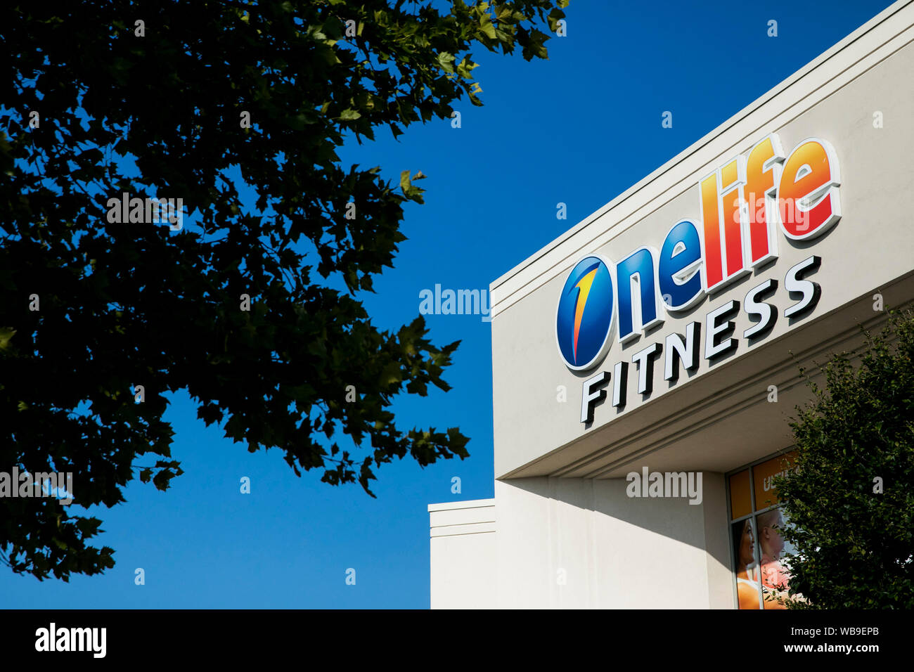 A logo sign outside of a Onelife Fitness location in Hagerstown, Maryland on August 8, 2019. Stock Photo