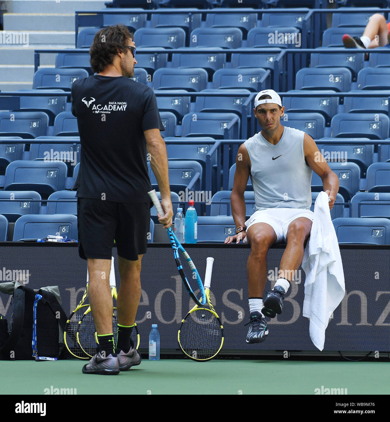 New York, USA. 25th Aug, 2019. Flushing Meadows New York US Open Tennis  25/08/2019 Rafa Nadal (ESP) takes a break from practice today on Arthur  Ashe court with Karen Khachanov (RUS) Credit: