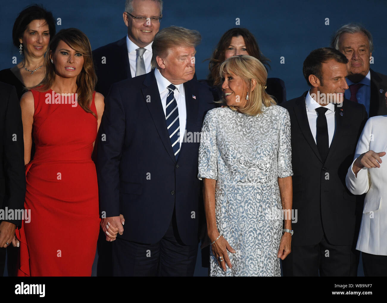Melania Trump, US President Donald Trump, Brigitte Macron, the wife of  French President Emmanuel Macron join other World Leaders for the family  photo at the G7 Summit in Biarritz, France Stock Photo -